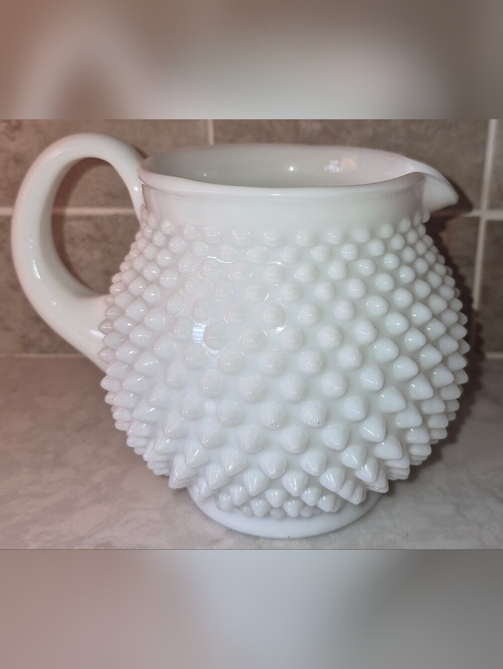 Vintage Fenton hobnail white milk glass pitcher, produced in the 1950s.